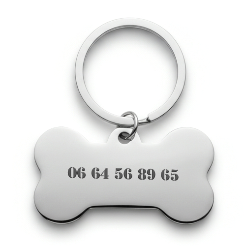 Gravierte Hundemarke in Knochenform Gravierte Hundemarke in Knochenform